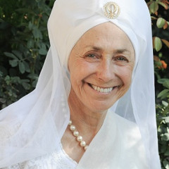 Headshot of Mukta K Khalsa in white and turban